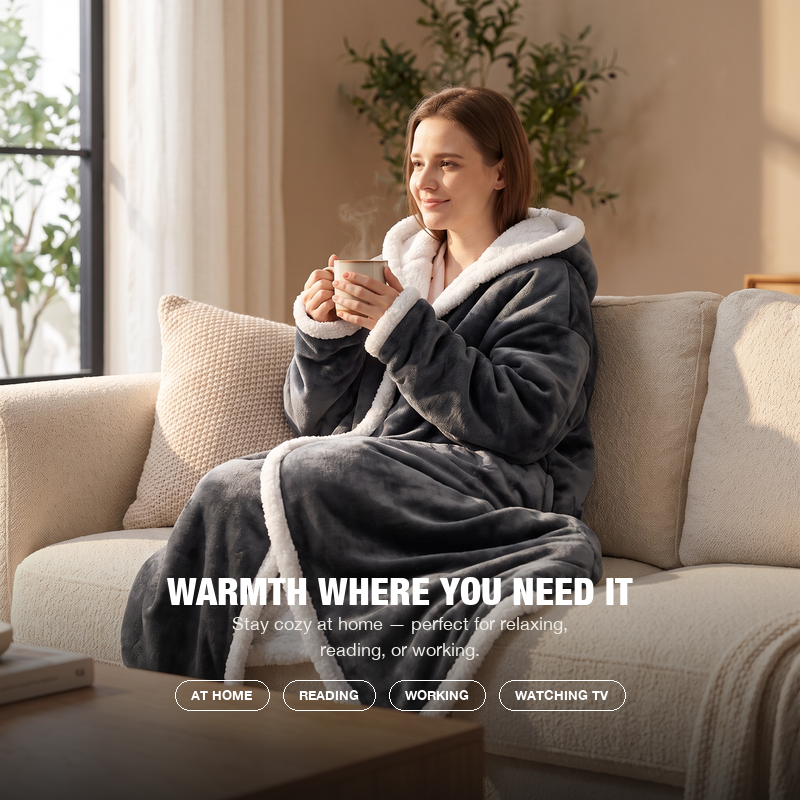 Relaxing on the sofa with a hot drink in the wearable heated blanket